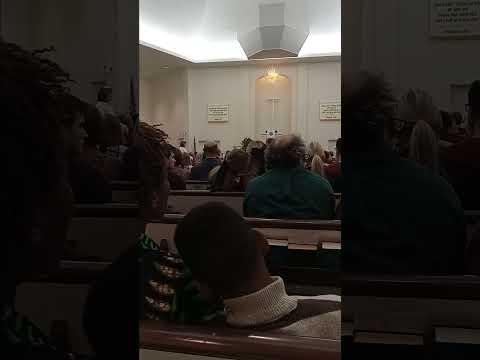 the dieners bring the buns: start of the moravian lovefeast, Christmas Eve, 2024