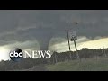 Reported 18 Tornadoes Tear Through Midwest