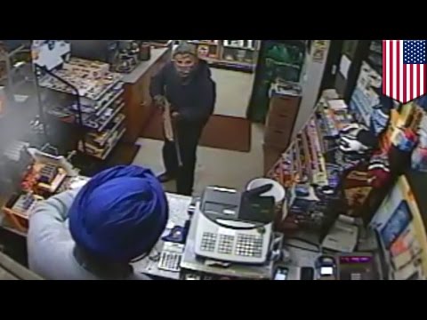Robbery fail: masked man with shotgun chased away by feisty convenience store clerk - TomoNews