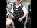 Police Officers Aproaching A Suspect
