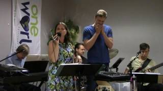 "Let's Work Together" by Canned Heat - performed by Asha Paul and the One World Band