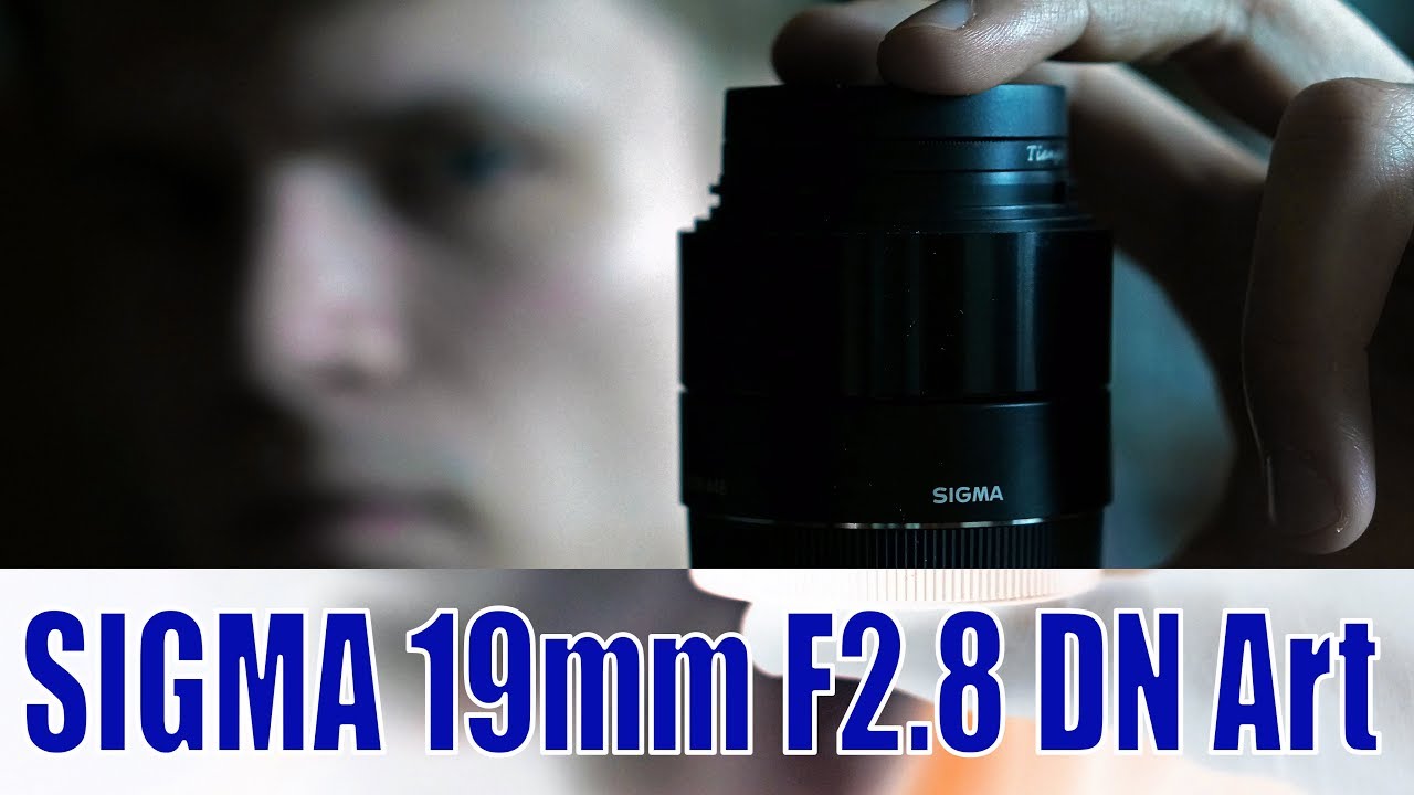 Объектив Sigma AF 30mm f/2.8 DN Art для Micro 4/3 серебро