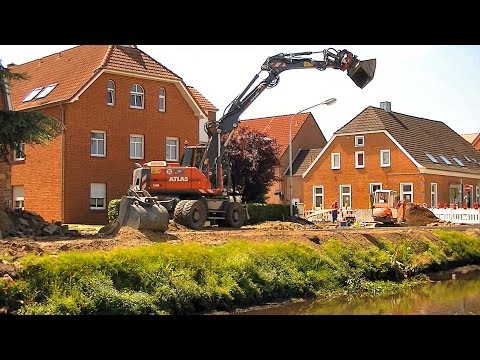 Mobilbagger Atlas 160W im Straßenbau/ Wheeled excavator Atlas 160W