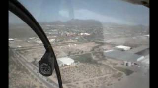 preview picture of video 'Flying the pattern solo Robinson R22 at Tucson Intl (TUS) with a headset-mounted camera'