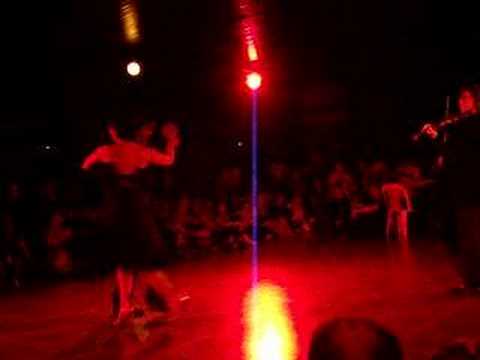  Corina de la Rosa  and  Julio Balmaceda  are  dancing  to  the  tango  "  Tu  "