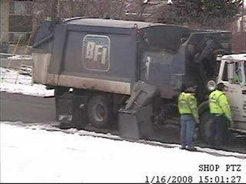 Guy narrates footage of garbage men failing to dispose of his broken garbage can.