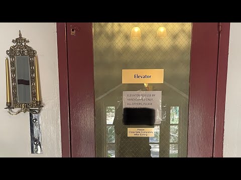 ANTIQUE GATED OTIS ELEVATOR IN A PRIVATE BUILDING IN SAN ANTONIO