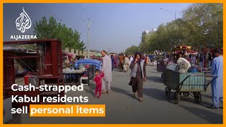 Kabul residents resort to selling household items to make ends meet