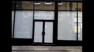 Boards of Canada / Warp Records white shop front 