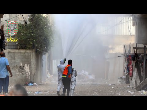 أعمال تعقيم حييّ الدرج والتفاح