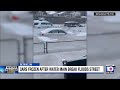 Vehicles submerged in frozen water in Detroit after neighborhood floods