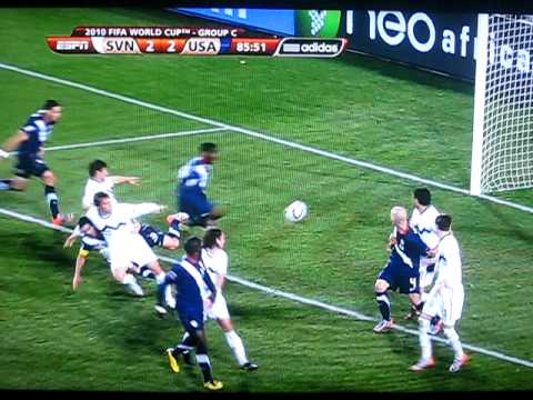 USA vs Slovenia Bocanegra being pushed down by the Slovenian