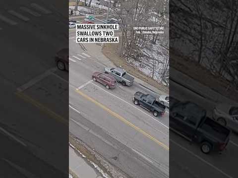 Video Thumbnail: Massive sinkhole swallows two cars in Nebraska