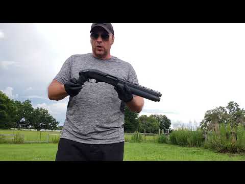 Remington 1100 short barrel shotgun, pistol grip, 12 inch barrel.