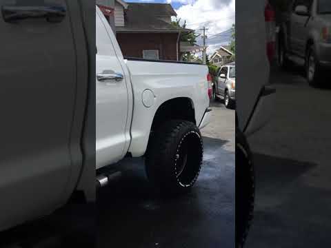 Lifted 2016 Toyota Tundra platinum on 24x14 custom fuel forged wheels