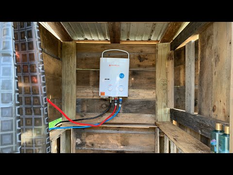 Off-Grid Outdoor Shower CAMPLUX Portable Hot Water Heater and Solar Panel Setup