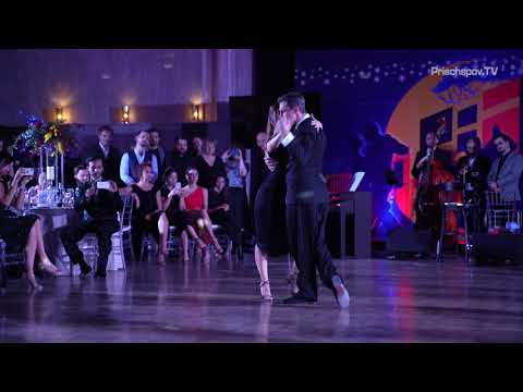  Sergey Kurkatov  and  Dana Zampieri  are  dancing  to  the  vals  "  La serenata de ayer  "  by  Juan D'Arienzo  at  La Boca Tango Festival  in  2021