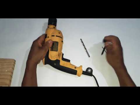 Vídeo: Como colocar broca na furadeira: perguntas e respostas