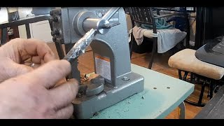 another method of cracking black walnuts,  arbor press