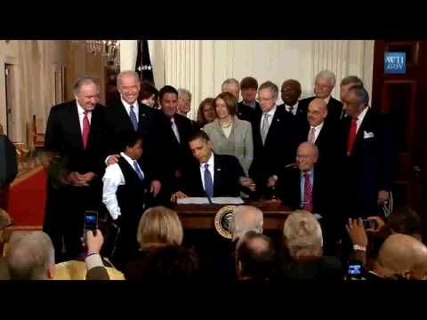 Barack Obama Signs the Patient Protection & Affordable Care Act