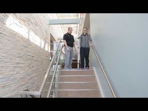 Crutch use: Descending stairs with a handrail