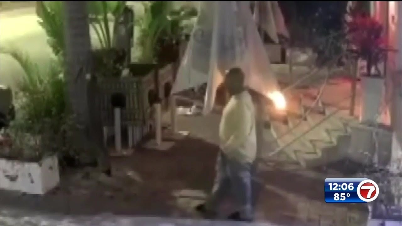 Video shows man setting South Beach bakery’s patio furniture ablaze; hostel’s dumpster also targeted