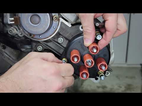 M119 Installing Distributor Caps and Spark Plugs