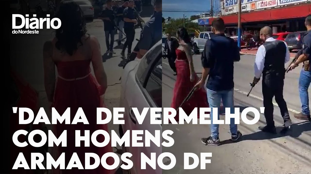 Imagem da notícia 'Dama de vermelho' atravessa rua escoltada por homens armados para ensaio de casamento no DF