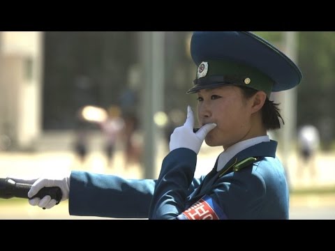 Driven to distraction: Pyongyang's 'traffic ladies'