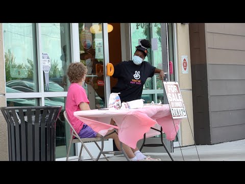Selling Donuts in Front of Dunkin' Donuts!