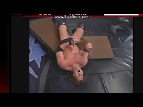 BAM Bam Biggelo back drops Mike Awesome through table