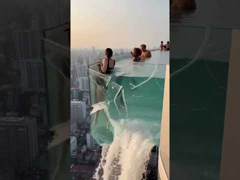 She was OKAY! Luckily she landed in a pool on a lower level 🙏