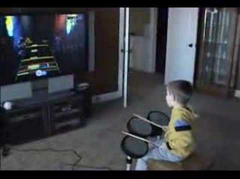 5 Year old playing Rockband on Expert