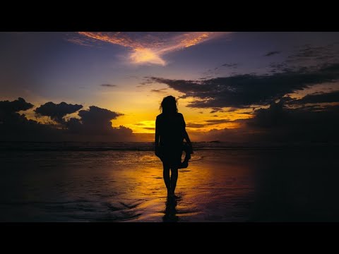Woman walking alone on the Beach at Sunset | Free Stock Footage No Copyright