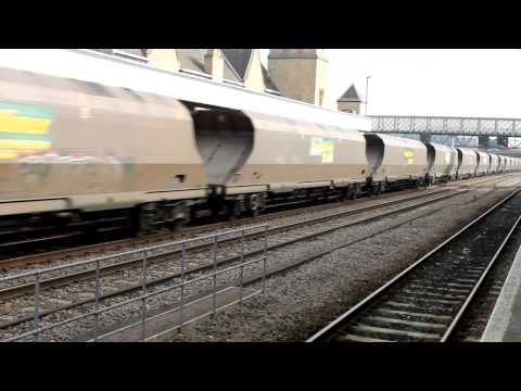 Freightliner class 66595 with empty HHA coal wagons