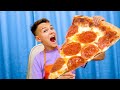 Five Kids and Dad learn to cook Pizza