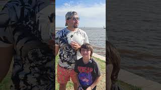 Poke-Tiger-Team opens packs by the water. 