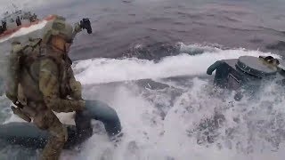 video: Drama on the high seas as suspected 'narco-submarine' boarded by US Coast Guard