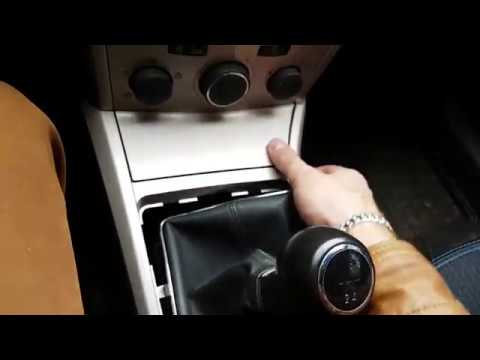 Как снять прикуриватель Opel Astra H