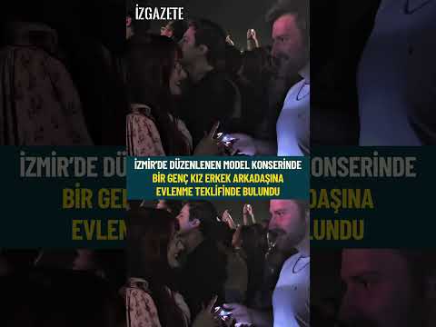 İzmir’de düzenlenen model konserinde bir genç kız erkek arkadaşına evlenme teklifinde bulundu#izmir