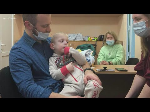 Couple escapes Ukraine with newly-adopted son who was on brink of death