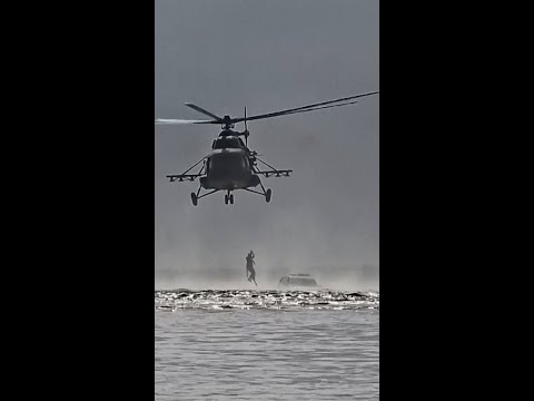 Man rescued by helicopter from flooded car in Syria