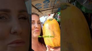 Buying Fresh Papaya from a Local Market in Granada!" 💵🛍️