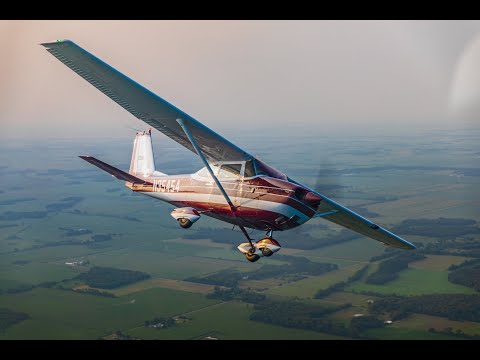 Formation landing at Oshkosh AirVenture 2023. 36L yellow dot.