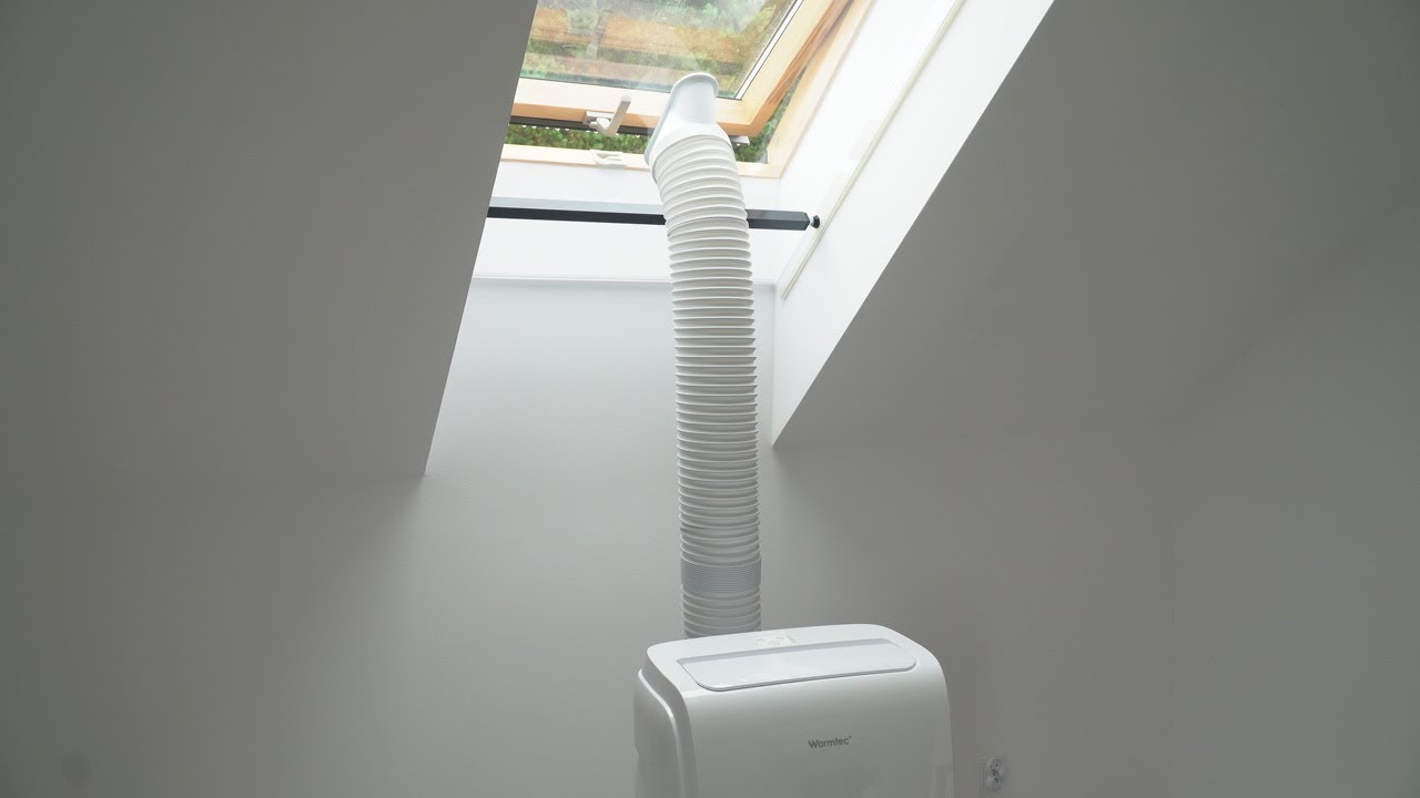 Klimatyzator przenośny na poddaszu w oknie dachowym - Rama okienna Warmtec TermoBlock UP - Montaż