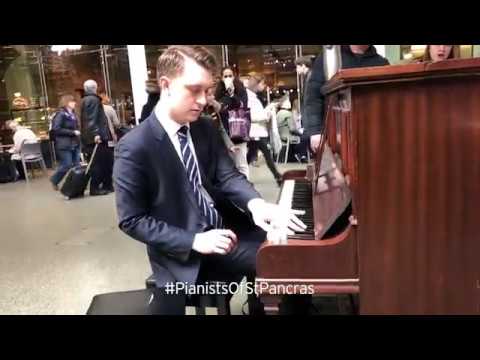 Gregg playing one of St. Pancras' public pianos