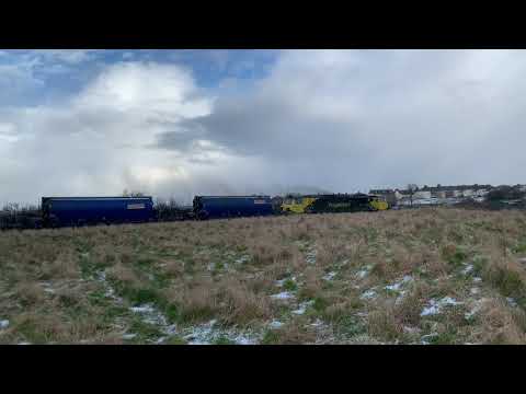 Freightliner class  70 70003  clag winter snow Redcar Coatham marsh pulls away clag
