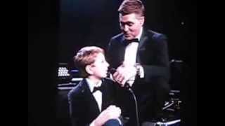 Kid On Stage With Michael Buble at Nashville, TN