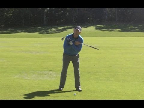 Golf lessons - How to play from a downhill lie