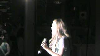 Madeline singing at LA Entertainment Fall Fashion Event